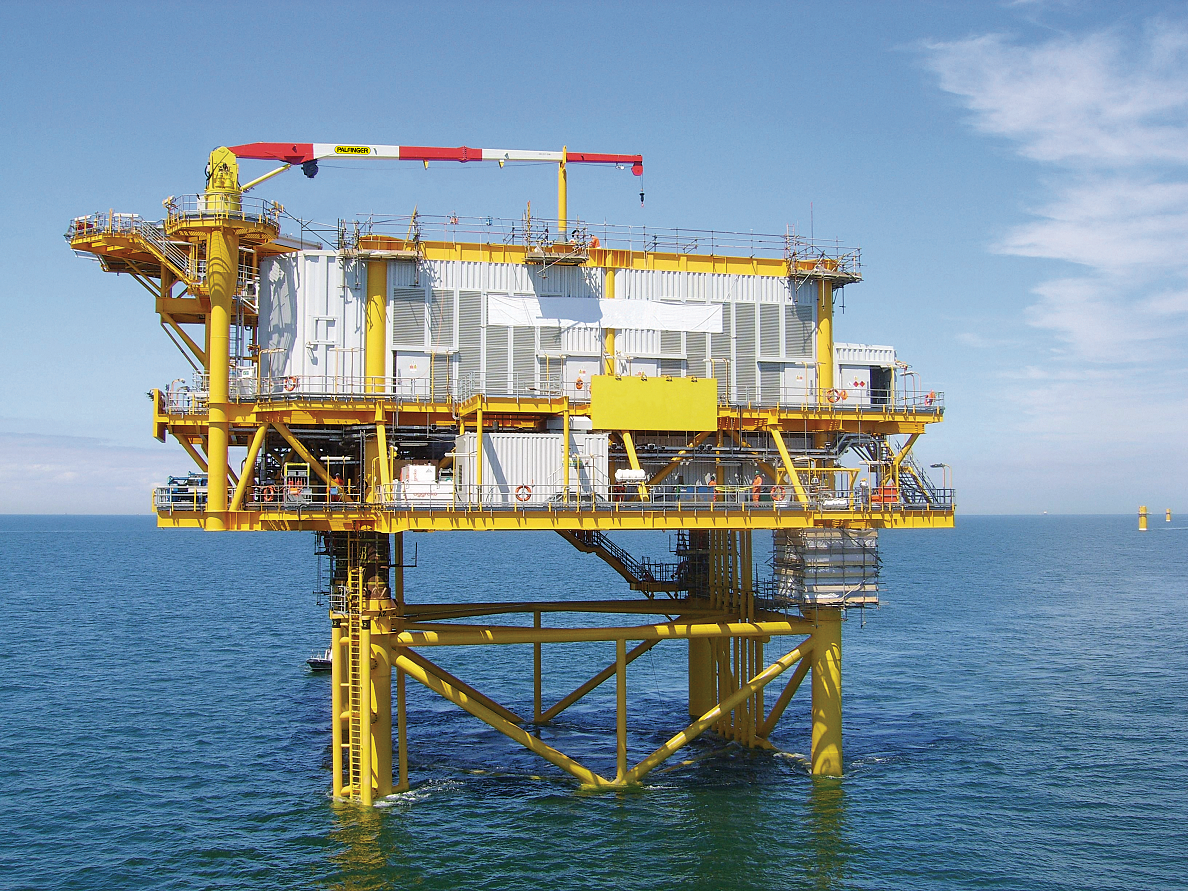 Image of a PALFINGER MARINE stiff boom crane installed on an offshore substation. 