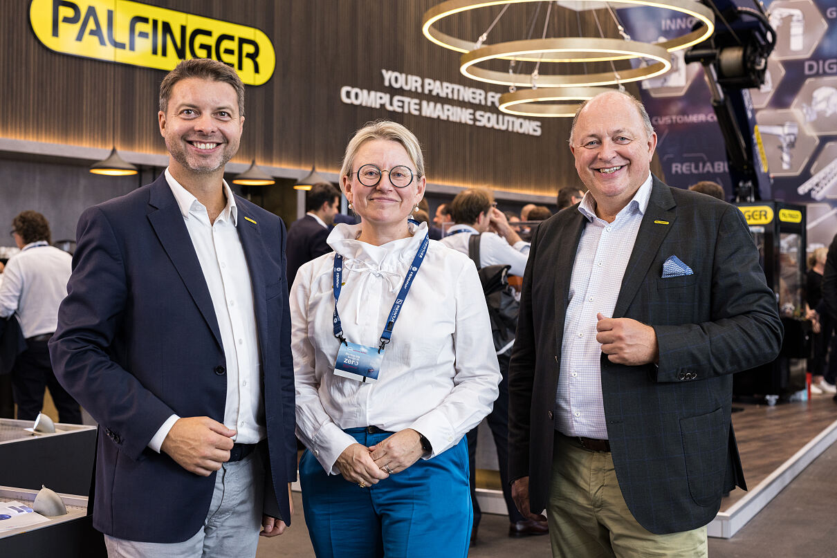 The memebers of the PALFINGER executive board at the PALFINGER MARINE exhibition stand 