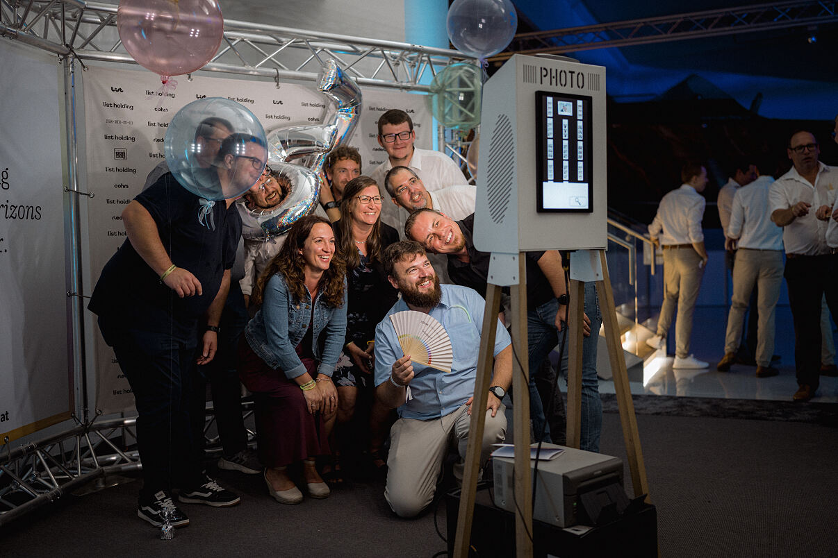Employees of the List Holding Group at the festive anniversary celebration.